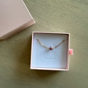 Elegant Gold and Pink Pearl Necklace